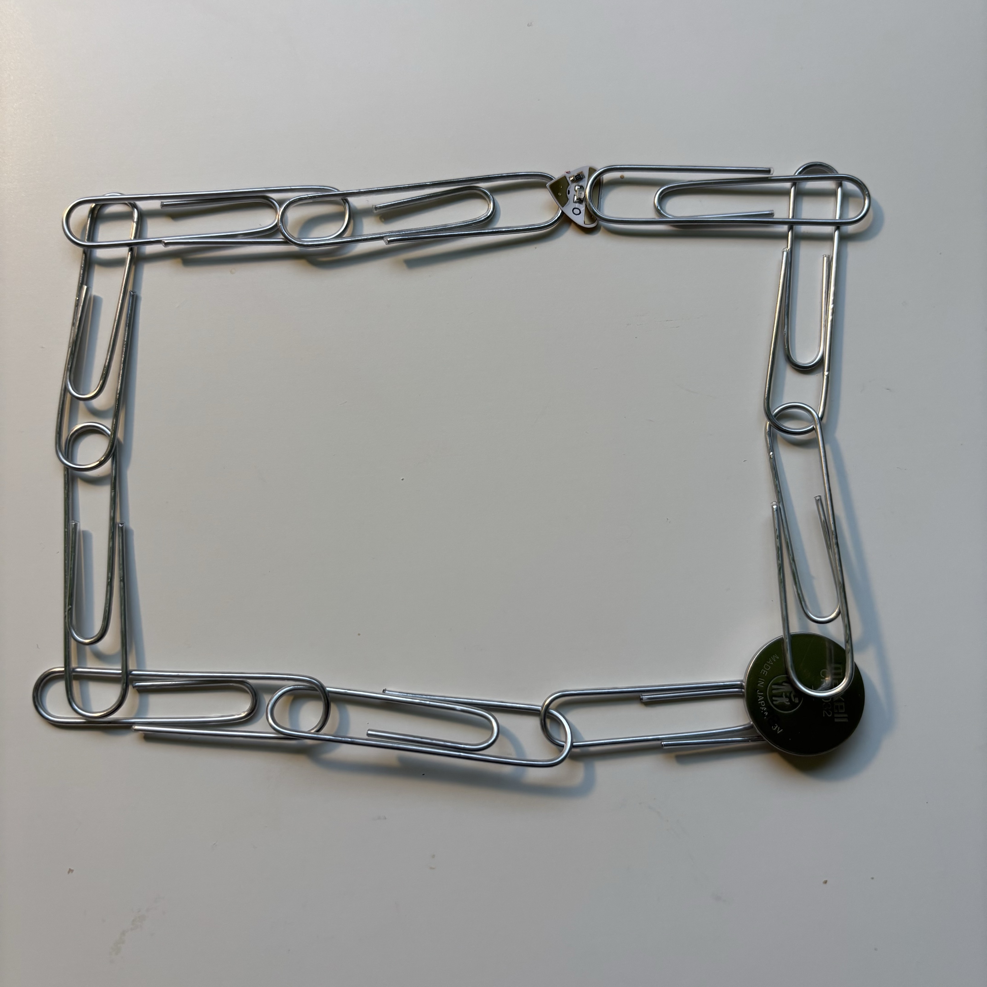 I connected the paper clips together and tried to build the circuit. Being metal, paperclips are certain to conduct electricity, however I failed this time as well. I later found out that the kind of paperclips I bought are wrapped in a layer of plastic on the outside, which is what makes them insulators. But I will keep the idea of using paperclips to build circuits and maybe use them when building the wearable final design.