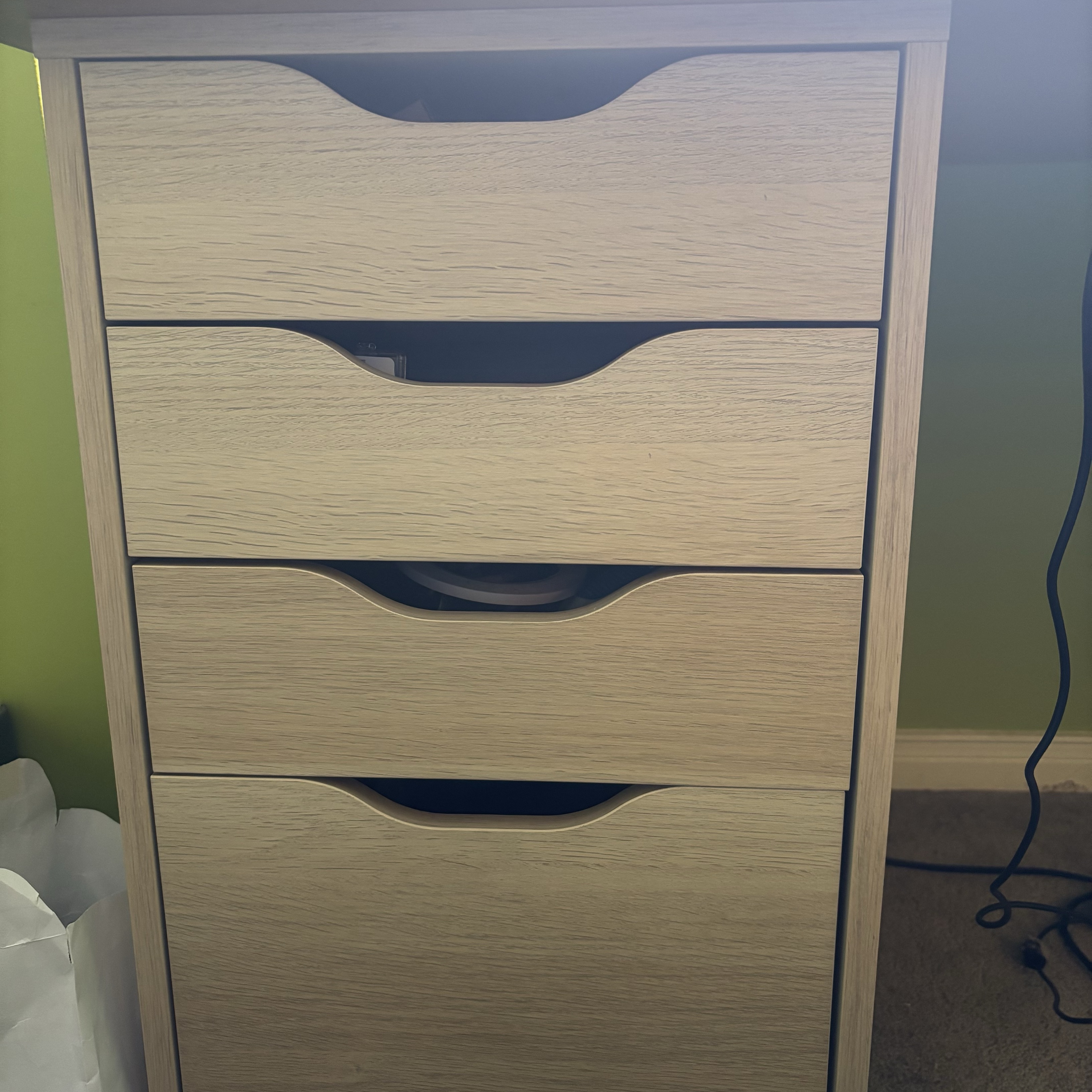 The sound of opening and closing a drawer.