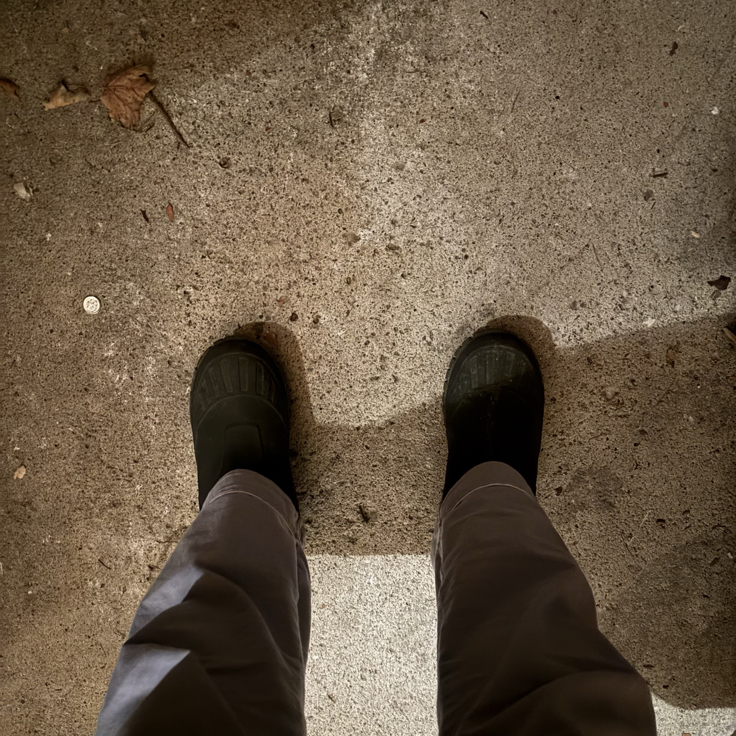 This is the sound of me walking on a concrete floor. The sound of walking on a concrete road is crisper and shorter than walking on any other material.