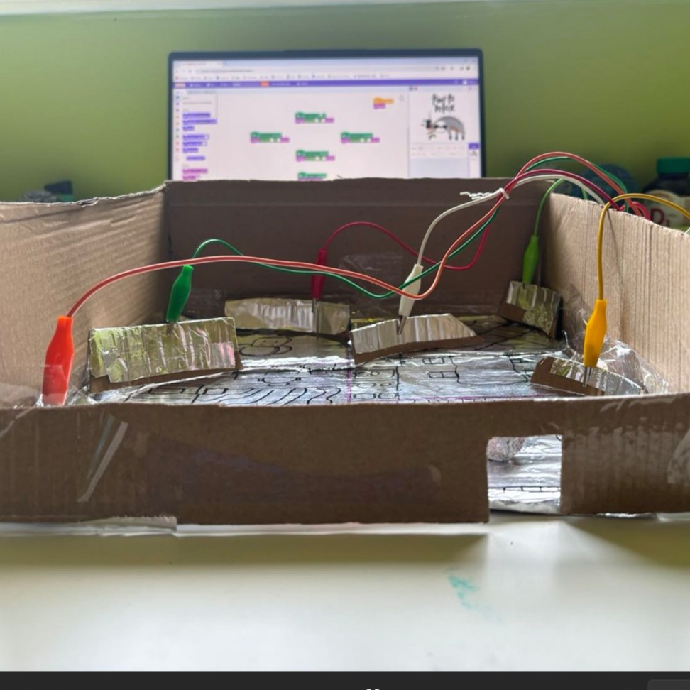 Here is the front view of the maze, where you can see that the base of each wall is made of an insulating material. This ensures that the circuit remains open when the ball is not in contact with the walls.