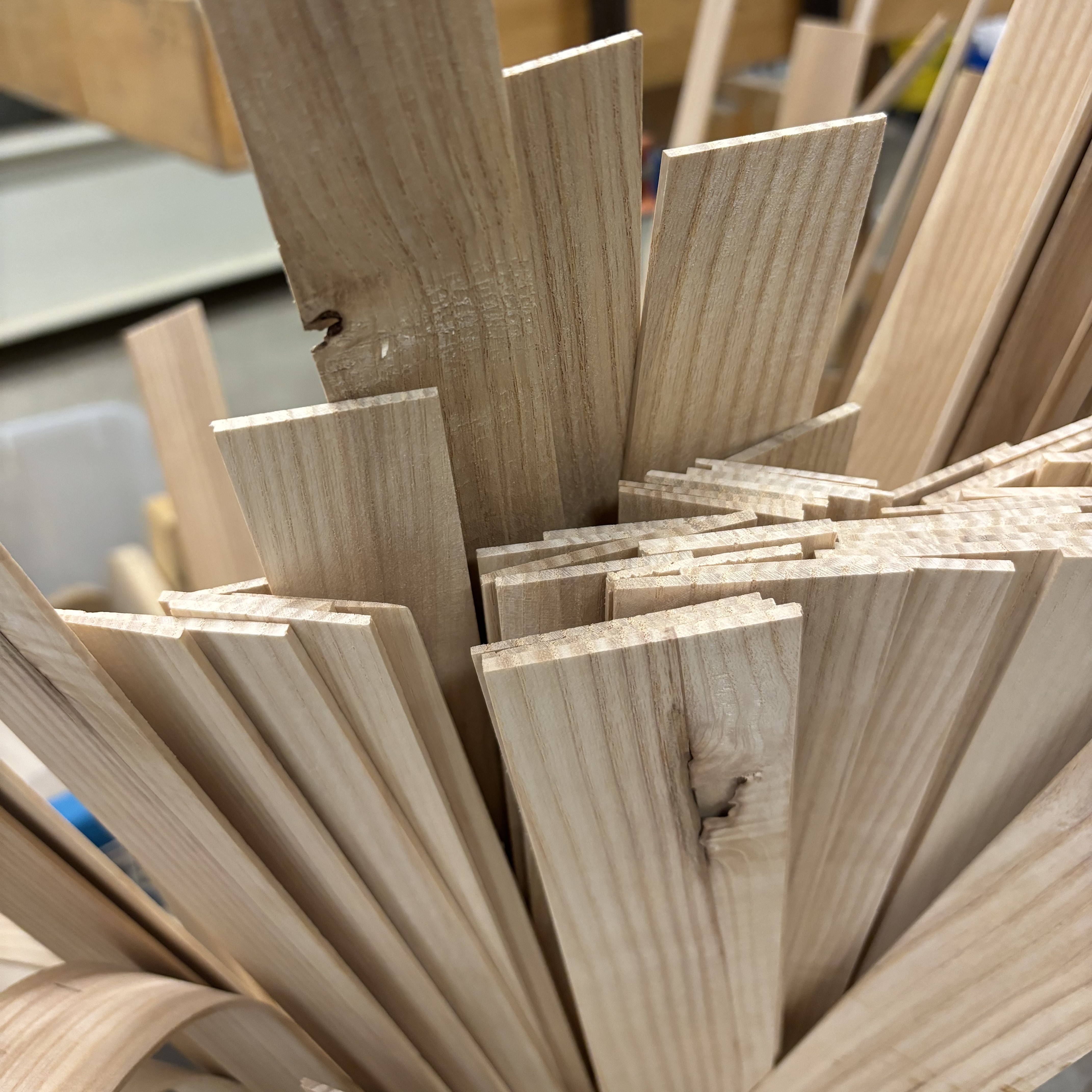 Thin wood panels found in the furniture design department at Sheridan College. Most are made of maple, cherry or ash. The surface is slightly rough, non-reflective, has a natural pattern, and can be bent to a desired curvature after soaking and heating. And is used to make baskets, chests, and other items.