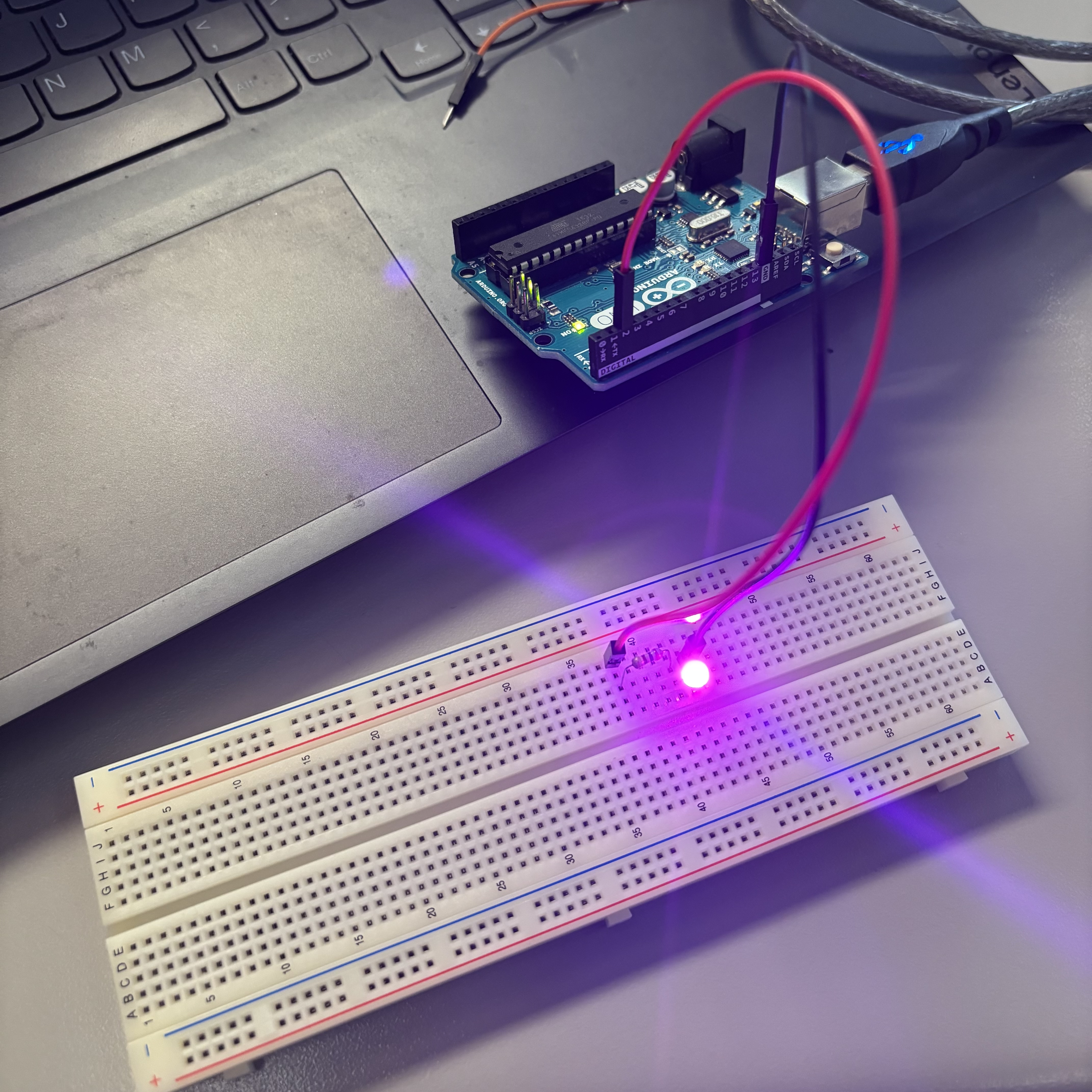 I added a resistor on the protoboard. A resistor has no polarity, but the only thing to pay attention to is placing it in parallel with the wires and the LED leads to ensure the circuit is connected properly. Since the LED is connected in series with the resistor, the resistor limits the current and protects both the LED and the Arduino. However, the difference is not very noticeable, probably because the resistance value is relatively small, so the LED’s brightness did not change much.
