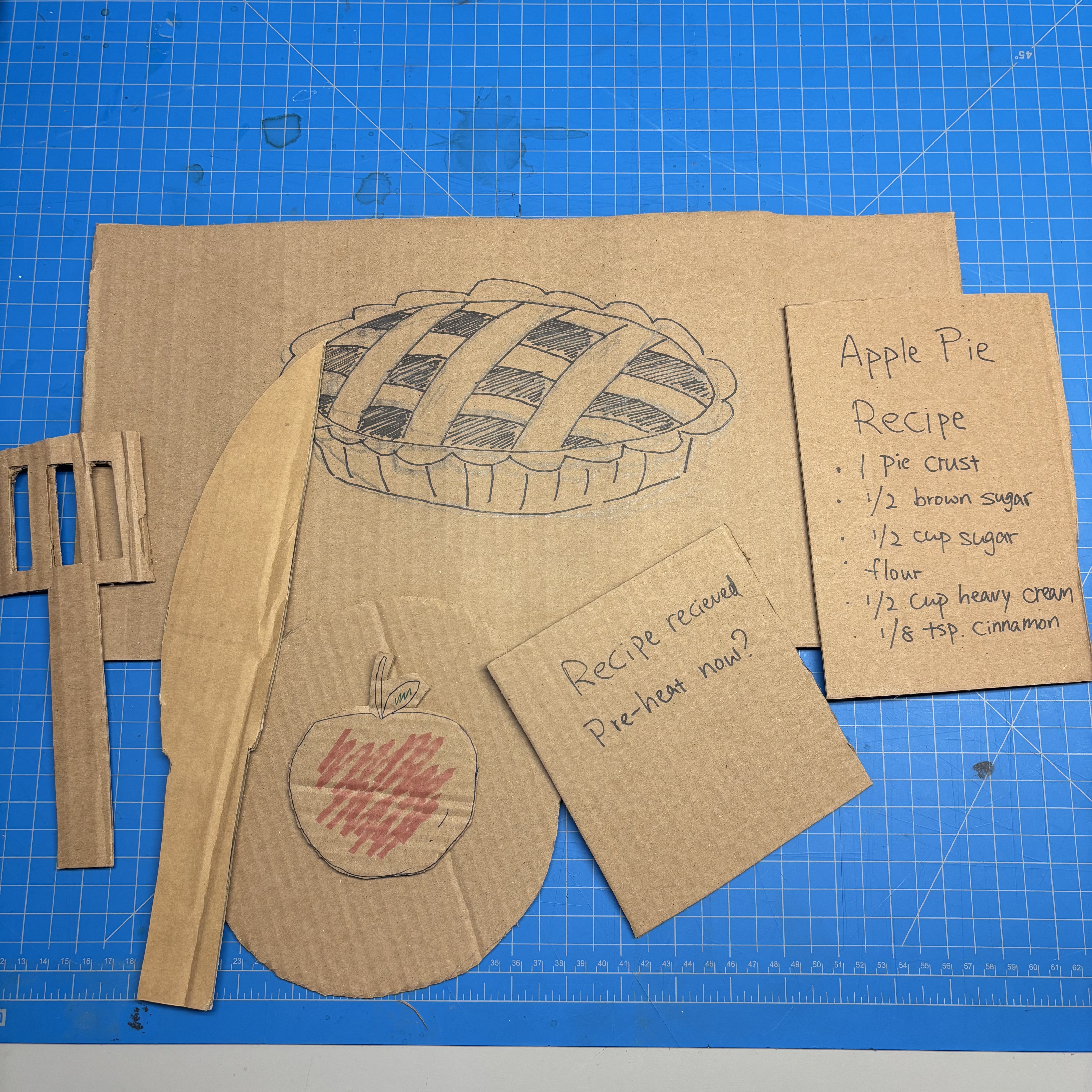 To better support bodystorming, we first created several props using cardboard to help users understand the next steps. At the same time, we made some signs that guide user actions and inform observers of the current state.